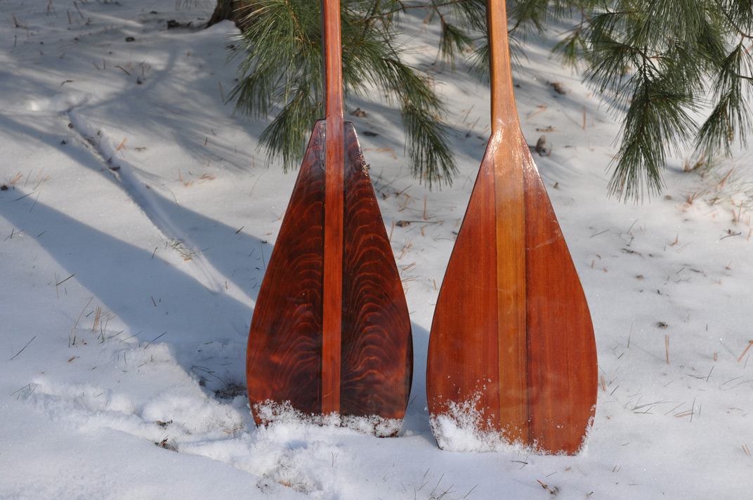 image of two custom built wood paddles
